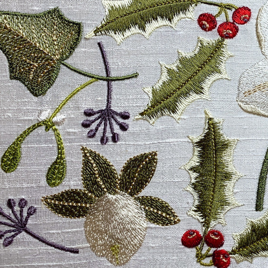Botanical machine embroidery: hellebores, green leaves, red berries