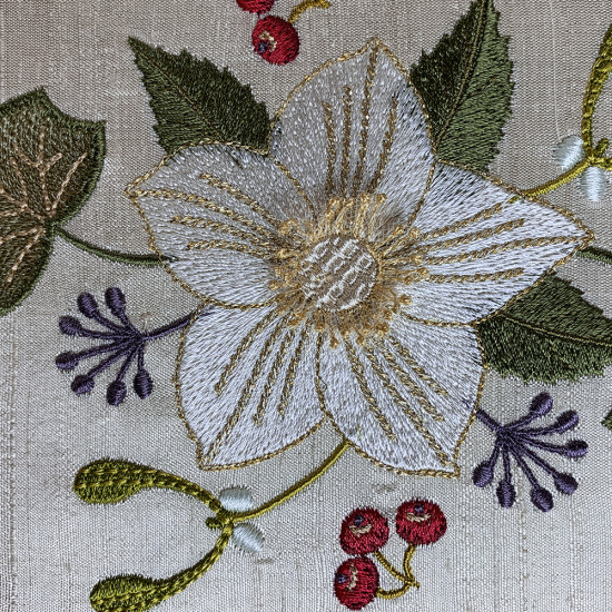 Botanical machine embroidery: hellebores, green leaves, red berrie