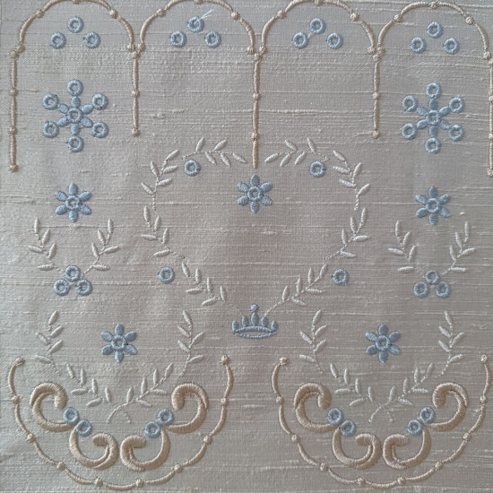  heirloom embroidery on cream silk with delicate eyelets, floral motifs, and fine satin stitches.